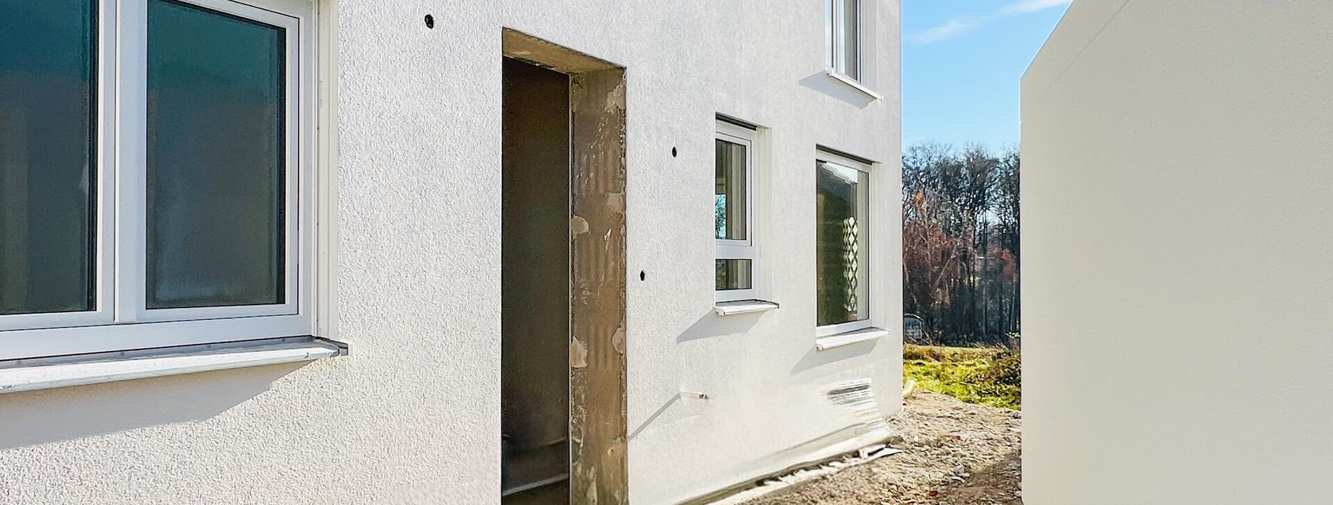 Gartenwohnung im Mehrfamilienhaus mit eigenem Eingang - zum Kauf in Trostberg | © HausBauHaus GmbH Traunstein