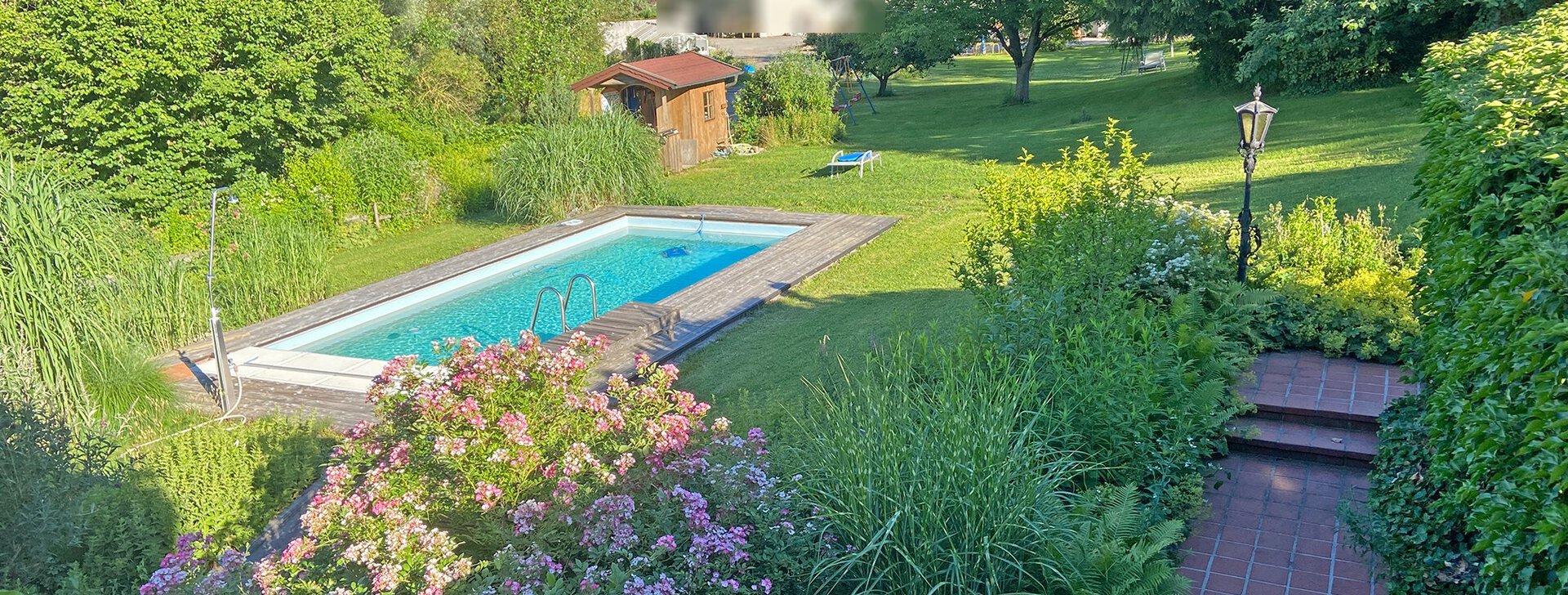 Garten, Anwesen mit Gewerbehalle, Immobilie kaufen, Kirchanschöring  | © HausBauHaus GmbH 