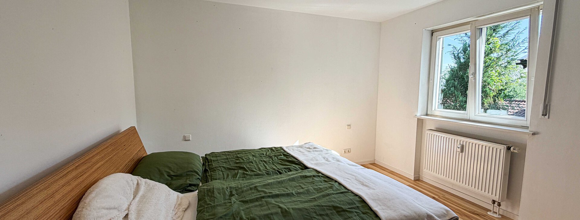 3-Zimmer-Wohnung in Rimsting am schönen Chiemsee zum Kauf - Schlafzimmer | © HausBauHaus GmbH Traunstein