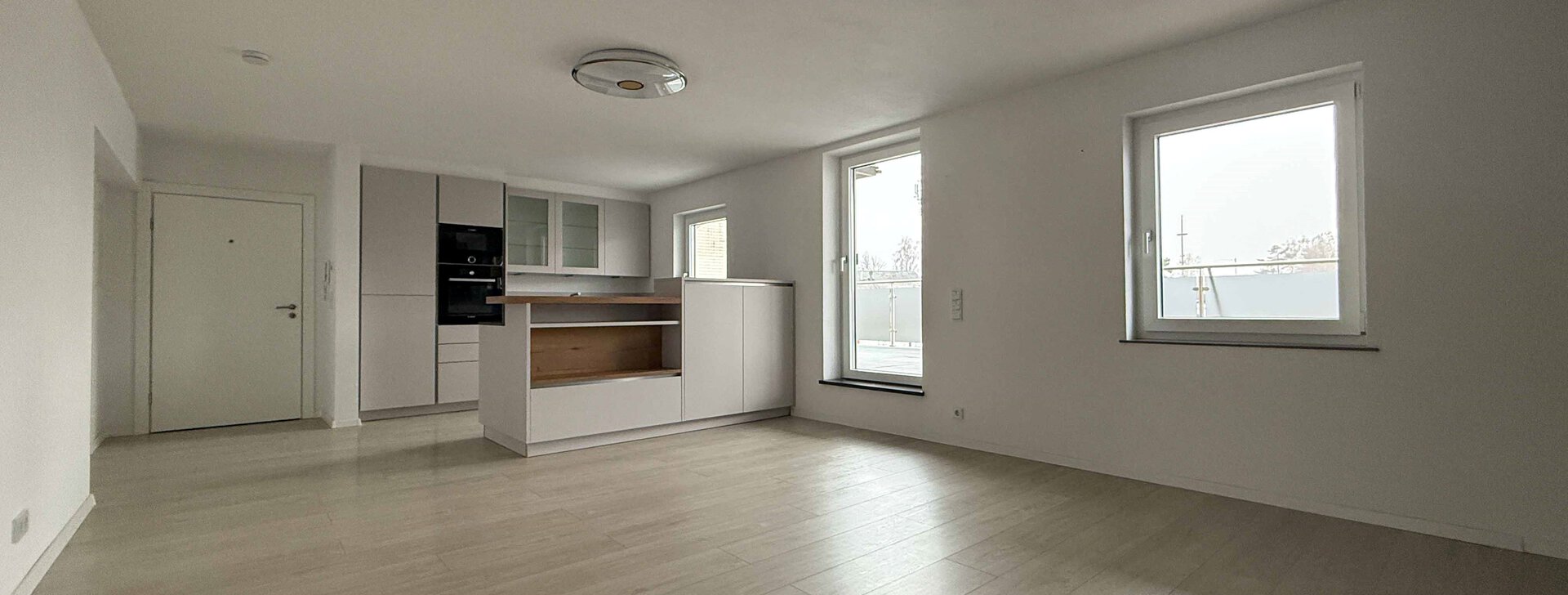 Wohn- und Essbereich, 3-Zimmer-Wohnung, Eigentumswohnung, Immobilie kaufen, Traunreut  | © HausBauHaus GmbH 