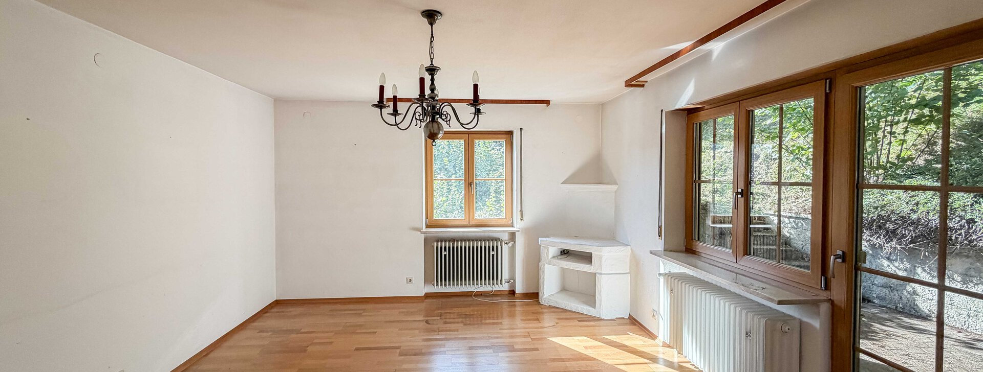 Haus zum Kauf - Wohnbereich mit Ausgang zur Terrasse | © HausBauHaus GmbH Traunstein
