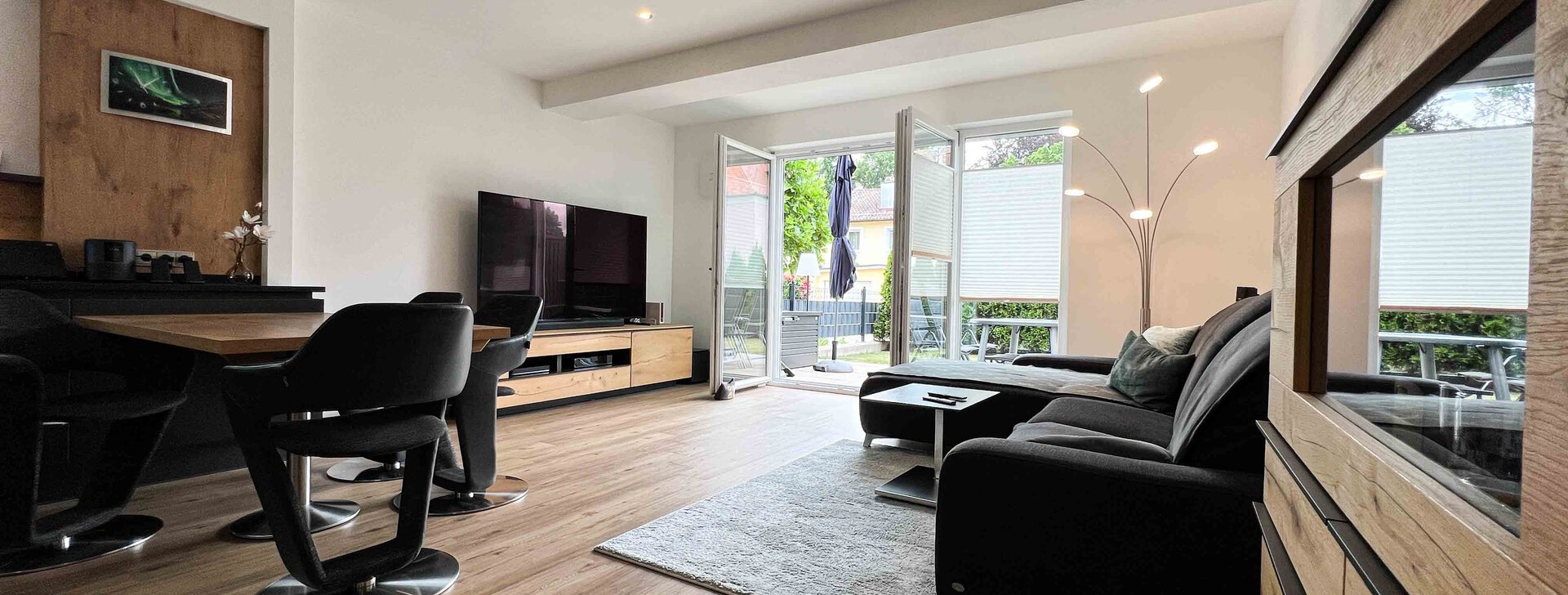 Wohnzimmer - 4-Zimmer-Wohnung mit Terrasse in Traunstein | © HausBauHaus GmbH Traunstein